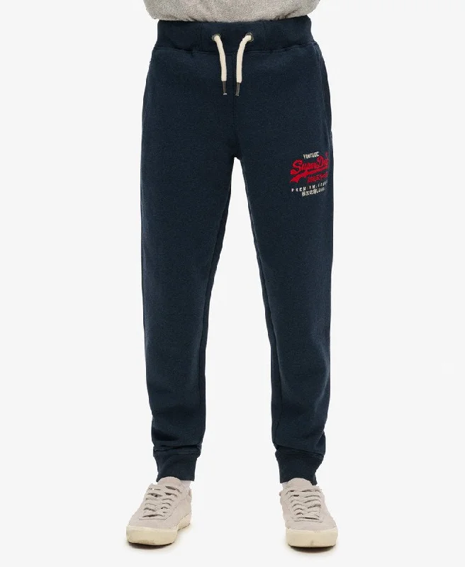 Men's Low-Waisted Pants for a Casual VibeDuo Vintage Logo Graphic Slim Jogger | Trench Navy Marle Men's Low-Waisted Pants for a Casual VibeDuo Vintage Logo Graphic Slim Jogger | Trench Navy Marle